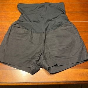 New, used once. Very comfortable and stretchy. Maternity shorts with pockets.